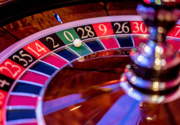 a roulette wheel with a ball on it